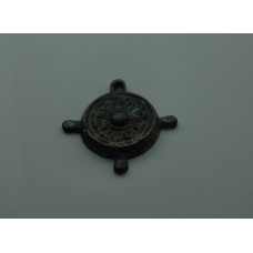 Cross with solar disc at the center